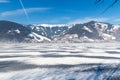 Frozen lake Zeller and snowy mountains in Austria Royalty Free Stock Photo