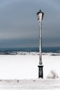 A frozen lamppost street light in the Kremlin of Nizhny Novgorod, Russia