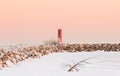 Frozen Lighthouse at Dusk, winter landscape scene