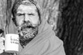 Man in blanket with cup Royalty Free Stock Photo