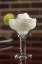 Frozen margarita with lime wheel Royalty Free Stock Photo