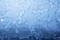 Frozen morning window, blurred ice blue background Royalty Free Stock Photo