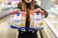 Frozen mozzarella sticks and Camembert bites in a package. March 9, 2023 Balti, Moldova. Illustrative editorial.