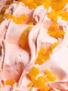 Frozen Peach flavour gelato - full frame detail. Close up of a beige surface texture of Ice cream Royalty Free Stock Photo