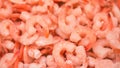 Frozen peeled shrimp are in the grocery store. Sale of marine products