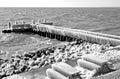 Frozen pier in Afsluitdijk in Netherlands