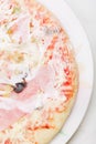 Frozen pizza on plate Royalty Free Stock Photo