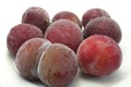Frozen plum on white background Royalty Free Stock Photo