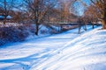 Frozen pond covered with snow in winter Royalty Free Stock Photo
