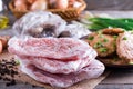 Frozen pork neck chops meat and pork schnitzel in a plate Royalty Free Stock Photo