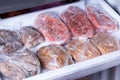 Frozen pork neck chops meat steakin the freezer. Frozen food