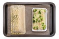 Frozen puff pastry with salmon and pollock fillet with broccoli and roasted almonds in a cream sauce lying on baking paper, isolat Royalty Free Stock Photo