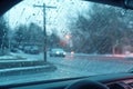 frozen rain droplets clinging to car windshield wipers