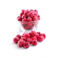 Frozen raspberries in a glass bowl isolated on white background Royalty Free Stock Photo