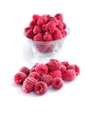 Frozen raspberries in a glass bowl on white background Royalty Free Stock Photo