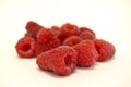frozen raspberries ifrozen raspberries isolated on a white background on the table Royalty Free Stock Photo