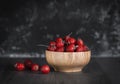 frozen red hawthorn berries on a dark background in bright light Royalty Free Stock Photo