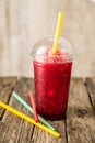 Frozen Red Slushie in Plastic Cup with Straw Royalty Free Stock Photo