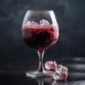 Frozen red wine in a glass, close-up, ice