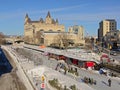 Frozen rideau canal with skaters and Fairmont ChÃÂ¢teau Laurier castle on a sunny winter day Royalty Free Stock Photo