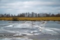 Frozen river with a breakable ice.