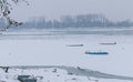 Frozen river Danube in ice, fishing boats Royalty Free Stock Photo