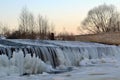 Frozen river - ice and snow on weir Royalty Free Stock Photo