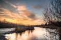 Frozen river in golden morning sky Royalty Free Stock Photo