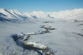 Frozen River Through a Mountain Valley Royalty Free Stock Photo