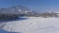 The frozen riverbed is covered with snow. Royalty Free Stock Photo