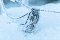 Frozen rope in winter. Huge icicles close up