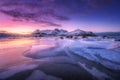 Frozen sea coast at colorful sunset in Lofoten islands, Norway Royalty Free Stock Photo