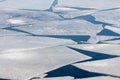 Frozen sea with pattern of ice floes