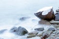 Cold sea water wawes at winter time. Ice cubes and snow at sea water