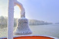 Frozen ship bell in winter time