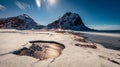 Frozen shore of Uttekleiv beach. Amazing night scene of Lofoten Islands, Norway, Europe