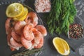 Frozen shrimp are prepared for cooking. Shrimp with spices savory lemon colored pepper dill and sea salt. Food preparation