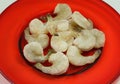 Frozen shrimp thawing on plate