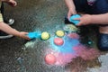 Frozen sidewalk paint preparation and use in a daycare/home school setting.