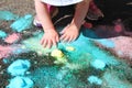 Frozen sidewalk paint preparation and use in a daycare/home school setting.