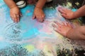 Frozen sidewalk paint preparation and use in a daycare/home school setting.