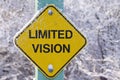 Frozen sign warning of limited vision ahead