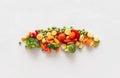 Frozen sliced vegetables on a white background. Frozen food concept. Top view, flat lay