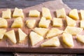 Frozen slices of frozen pineapple on a cutting board Royalty Free Stock Photo