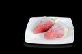 Frozen slices of watermelon on a plate Royalty Free Stock Photo