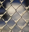 Frozen snow on a fence Royalty Free Stock Photo