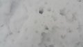 Frozen Snow Ice Texture - Top view texture of surface with grey ice covered in white snow Royalty Free Stock Photo