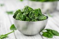 Frozen spinach cubes close up; selective focus Royalty Free Stock Photo