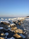 Frozen stones at Baltic sea shore