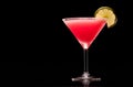 Frozen strawberry daiquiri garnished with slice of lime on a black background. Classic Hemingway cocktail Royalty Free Stock Photo